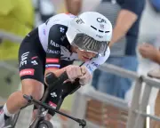 Pogacar wins Vuelta opener by 0.09 seconds, takes red jersey