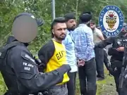 Police smash BMW to arrest London men with swords, loaded gun