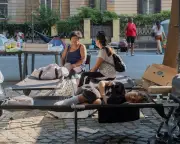 Rome scrambles to house 200+ camping in heat after squat eviction