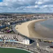 Search launched for woman who entered sea alone at Dorset beach