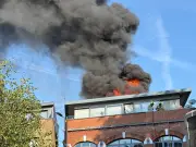 Shoreditch fire: black smoke over London, road closed