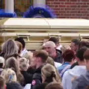 Teen killed in wrong-way M9 crash laid to rest in gold coffin