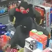 Thieves bicker in fake Scouse accents during robbery caught on CCTV