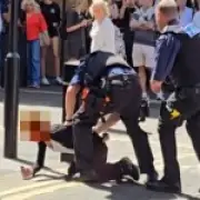 Woman charged after four men stabbed in Covent Garden