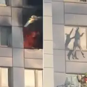 Woman jumps from burning 11th-floor Berlin flat to escape blaze