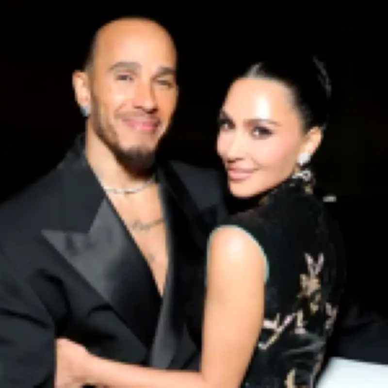 Kim Kardashian and Lewis Hamilton share first public kiss at LA event