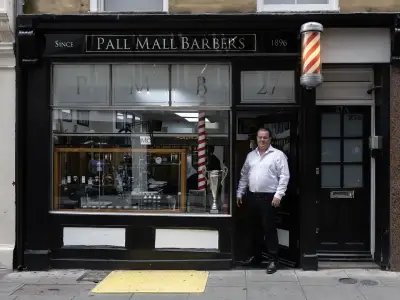 Dyslexic school leaver now runs iconic 130-year-old London barbershop
