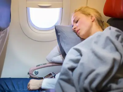Flight attendant warns against sleeping on plane windows due to germs