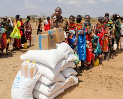 Global aid system crumbles as 64m fewer people receive help
