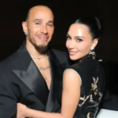 Kim Kardashian and Lewis Hamilton share first public kiss at LA event