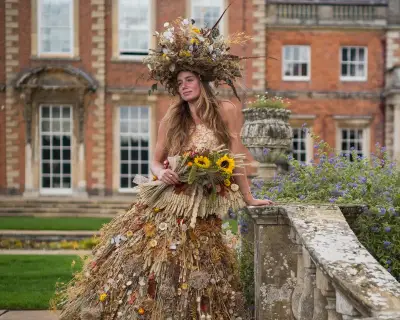 Photos of the day: Harvest ballgown, West Bank raid, and more