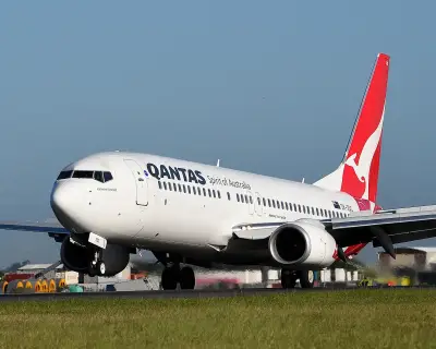 Qantas flight from Queenstown to Sydney reroutes after engine flames seen