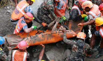 Tunnel Rescue and Flooded Wedding: Photos of the Day - Friday
