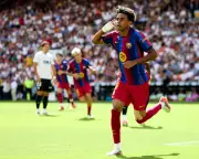 Lamine Yamal's double powers Barcelona to 5-0 rout of Valencia