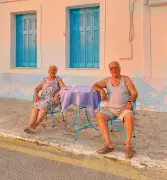 Photographer's iPhone shot captures elderly couple's silent tranquillity in Poros